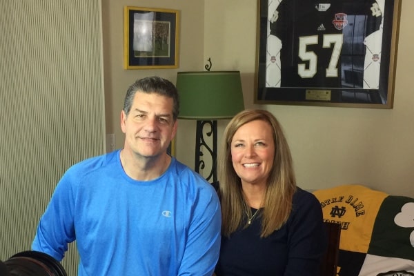 Christine Golic with her husband Mike Golic in a smiley face